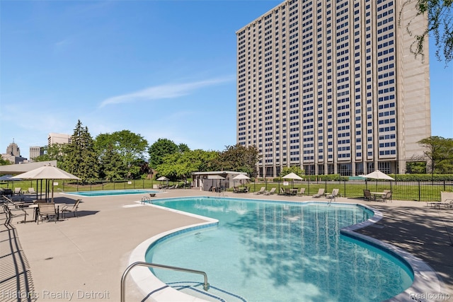 1300 E Lafayette St Unit 1604, Detroit, MI 48207 - community pool featuring a patio