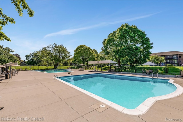 1300 E Lafayette St Unit 1604, Detroit, MI 48207 - community pool with a patio