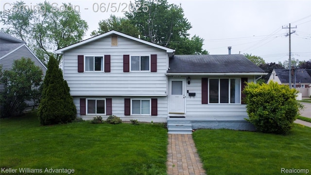 3714 Prairie Ave, Berkley, MI 48072 - tri-level home featuring a front lawn and a shingled roof