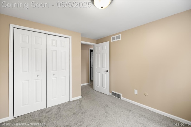 3714 Prairie Ave, Berkley, MI 48072 - unfurnished bedroom with carpet flooring, baseboards, and a closet