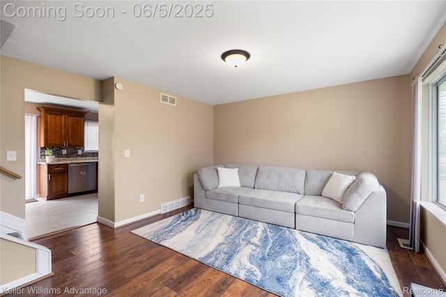 3714 Prairie Ave, Berkley, MI 48072 - living room with plenty of natural light, light wood-type flooring, and baseboards