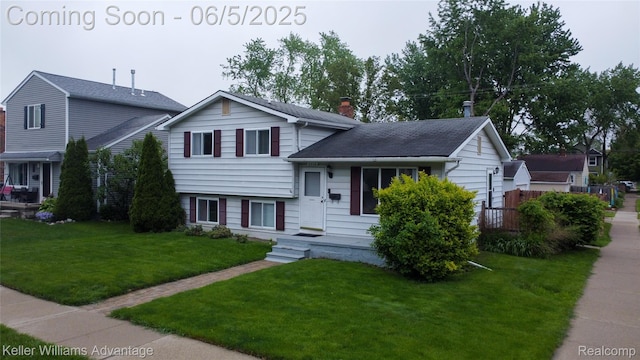 3714 Prairie Ave, Berkley, MI 48072 - tri-level home featuring a chimney and a front yard