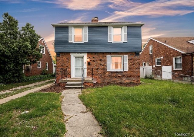 20036 Appoline St, Detroit, MI 48235 - colonial-style house with a chimney, brick siding, and cooling unit