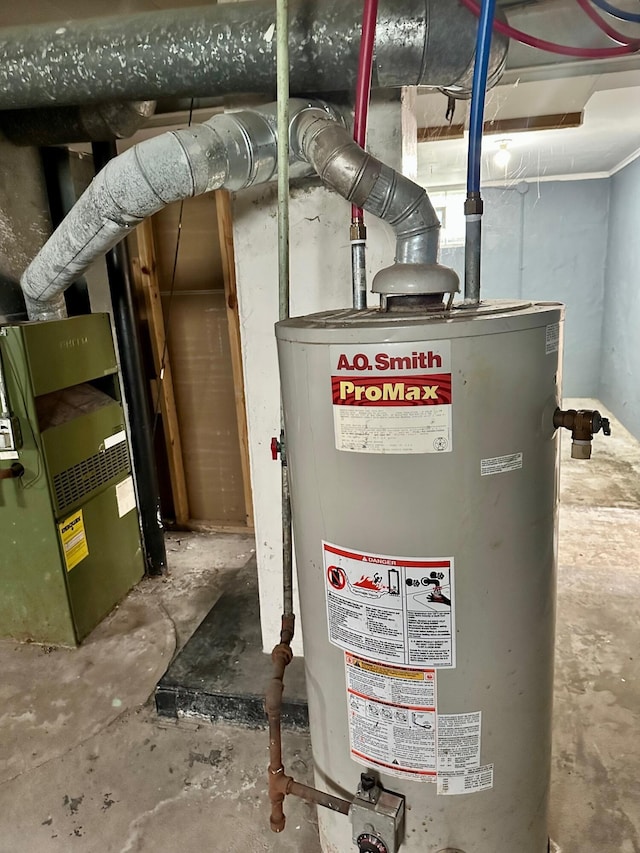 utility room featuring water heater