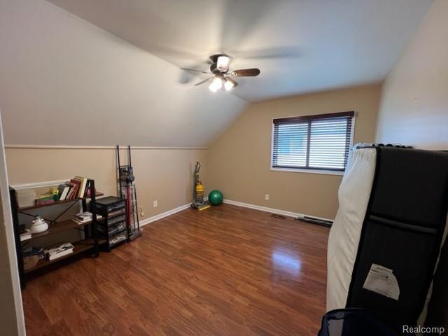15743 Greenview, Fraser, MI 48026 - bonus room with a ceiling fan, wood finished floors, baseboards, and lofted ceiling