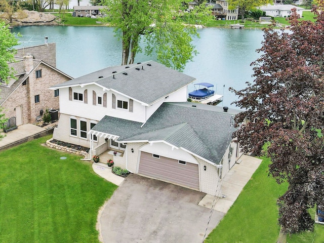 3732 Loch Dr, Highland, MI 48357 - aerial view of residential area featuring a large body of water