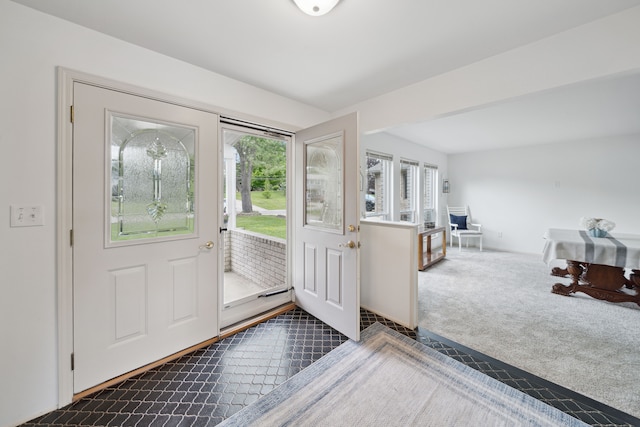 3732 Loch Dr, Highland, MI 48357 - carpeted foyer entrance featuring plenty of natural light and tile patterned flooring