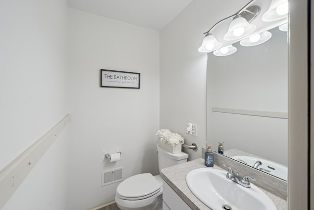 3732 Loch Dr, Highland, MI 48357 - bathroom featuring toilet and vanity