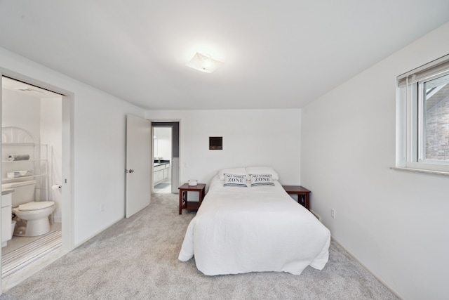 3732 Loch Dr, Highland, MI 48357 - carpeted bedroom with ensuite bathroom