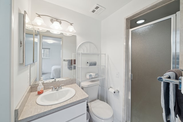 3732 Loch Dr, Highland, MI 48357 - ensuite bathroom with vanity, a shower stall, and toilet
