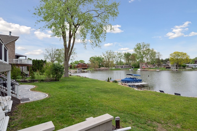 3732 Loch Dr, Highland, MI 48357 - view of green lawn with a water view and a boat dock