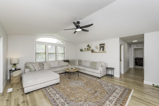 9561 Springville Hwy, Onsted, MI 49265 - living room with light wood-style flooring, ceiling fan, lofted ceiling, and baseboards