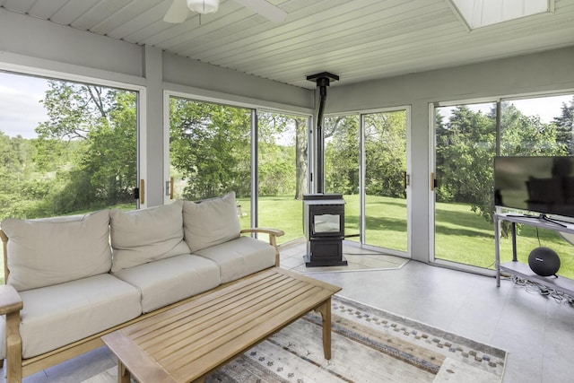 9561 Springville Hwy, Onsted, MI 49265 - sunroom featuring a wood stove