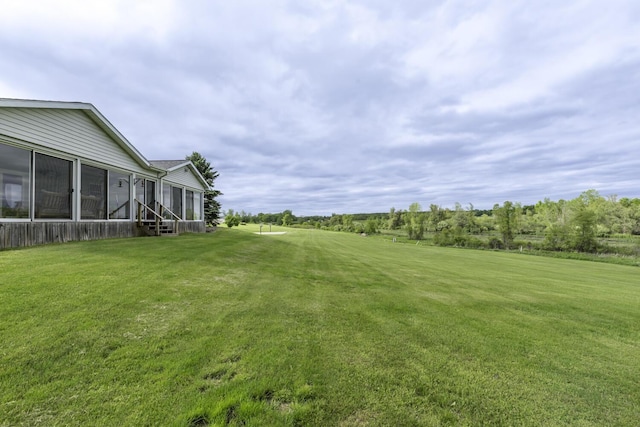 9561 Springville Hwy, Onsted, MI 49265 - view of green lawn with a sunroom