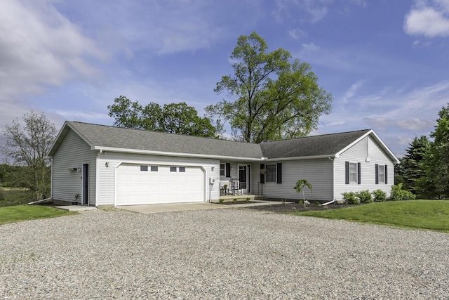 9561 Springville Hwy, Onsted, MI 49265 - single story home featuring an attached garage, driveway, a front lawn, and roof with shingles