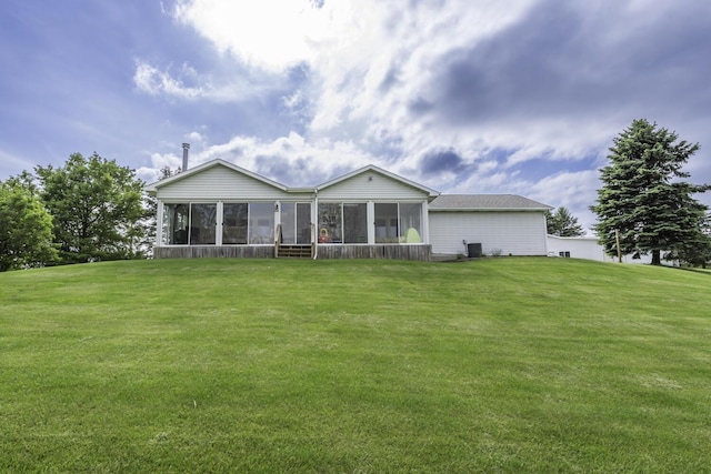 9561 Springville Hwy, Onsted, MI 49265 - rear view of property with a sunroom and a yard