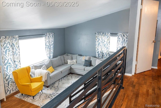 771 Easley Dr, Westland, MI 48186 - living room with wood finished floors, baseboards, and vaulted ceiling