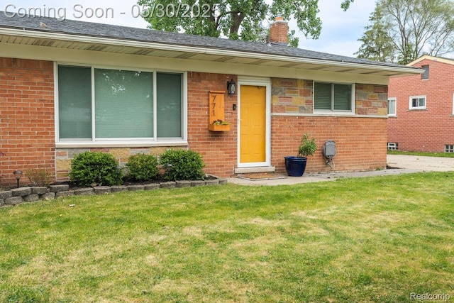 771 Easley Dr, Westland, MI 48186 - single story home featuring a front lawn, brick siding, and a chimney