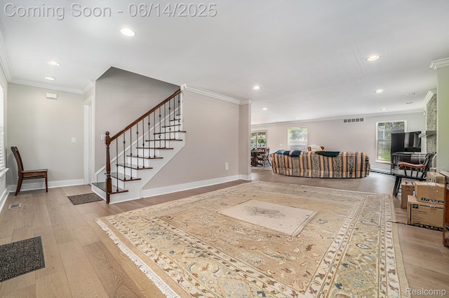 4715 Mandalay Ave, Royal Oak, MI 48073 - living room with ornamental molding, recessed lighting, wood finished floors, and stairs