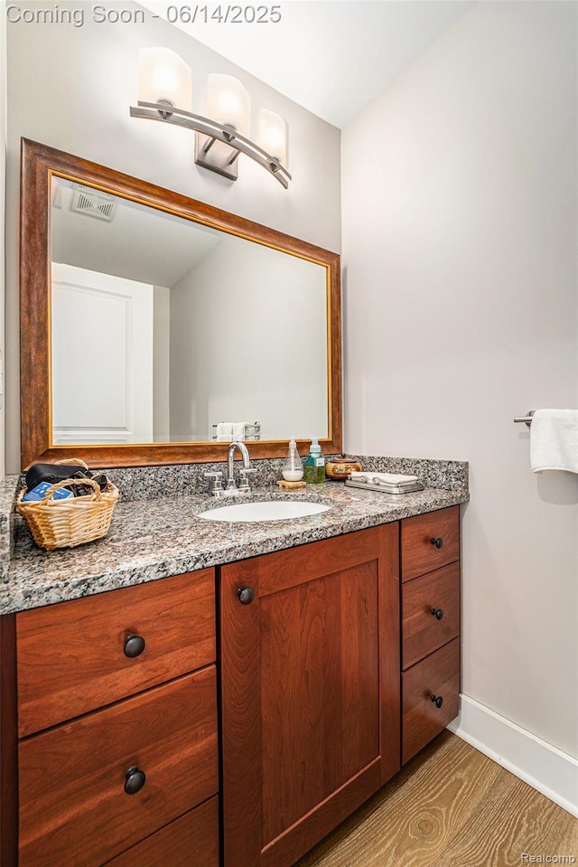 4715 Mandalay Ave, Royal Oak, MI 48073 - bathroom with vanity and baseboards