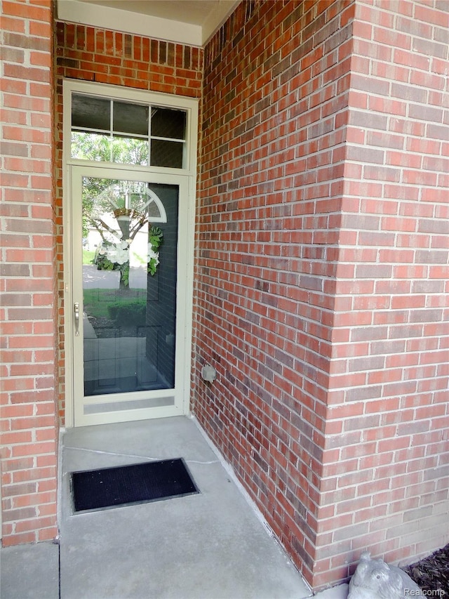14478 Shadywood Dr, Sterling Heights, MI 48312 - property entrance featuring brick siding