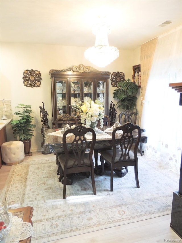 14478 Shadywood Dr, Sterling Heights, MI 48312 - dining room featuring wood finished floors