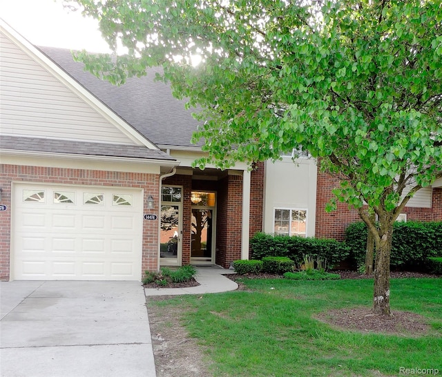 14478 Shadywood Dr, Sterling Heights, MI 48312 - view of front of home featuring concrete driveway, a shingled roof, brick siding, and a front yard