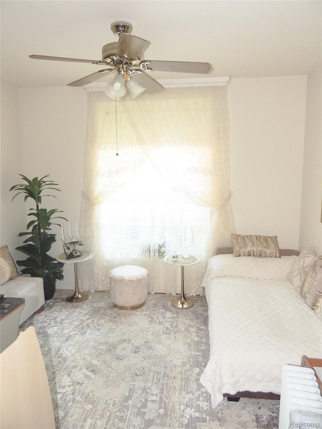 14478 Shadywood Dr, Sterling Heights, MI 48312 - bedroom with radiator and ceiling fan