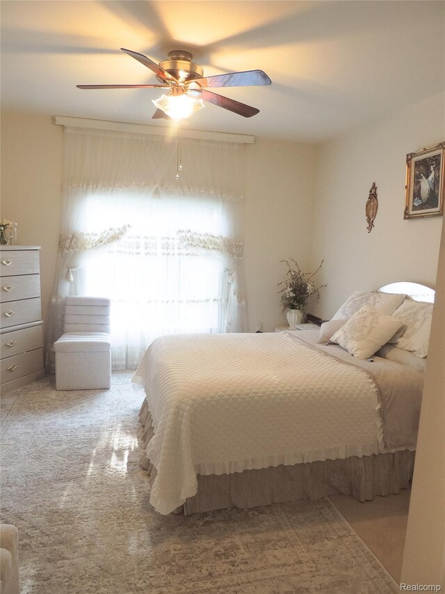 14478 Shadywood Dr, Sterling Heights, MI 48312 - bedroom with a ceiling fan and carpet floors