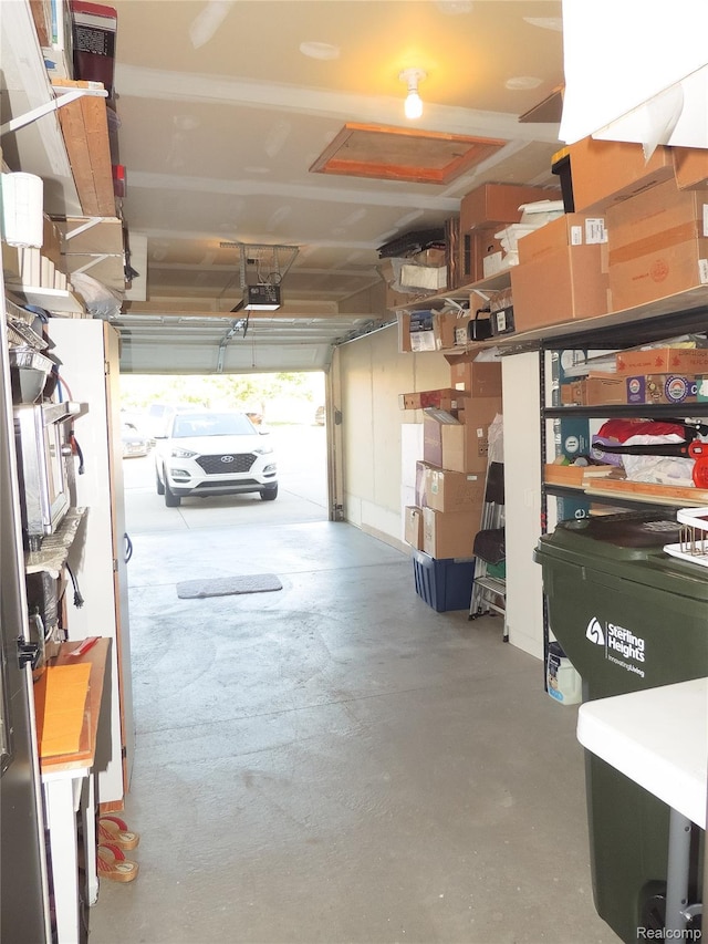 14478 Shadywood Dr, Sterling Heights, MI 48312 - garage featuring a garage door opener