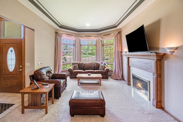 1506 Golfside Ct, Flushing, MI 48433 - tiled living room with carpet floors and a fireplace with flush hearth