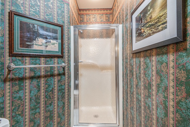 1506 Golfside Ct, Flushing, MI 48433 - bathroom with a stall shower and wallpapered walls