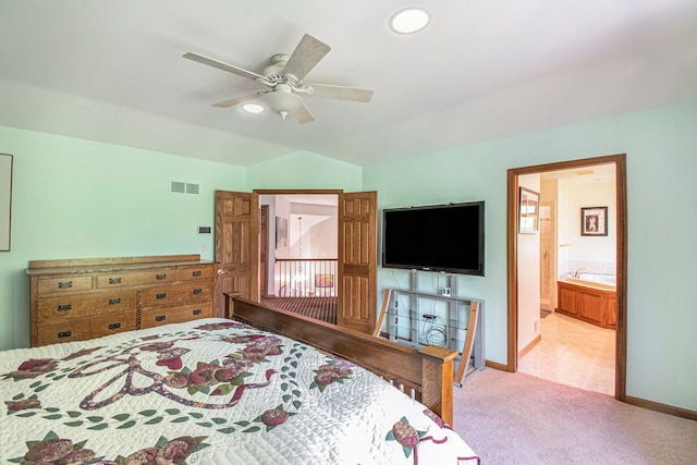 1506 Golfside Ct, Flushing, MI 48433 - bedroom with carpet, baseboards, lofted ceiling, ensuite bathroom, and ceiling fan