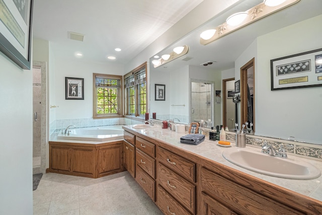 1506 Golfside Ct, Flushing, MI 48433 - full bathroom featuring a stall shower, a bath, tile patterned floors, double vanity, and a spacious closet