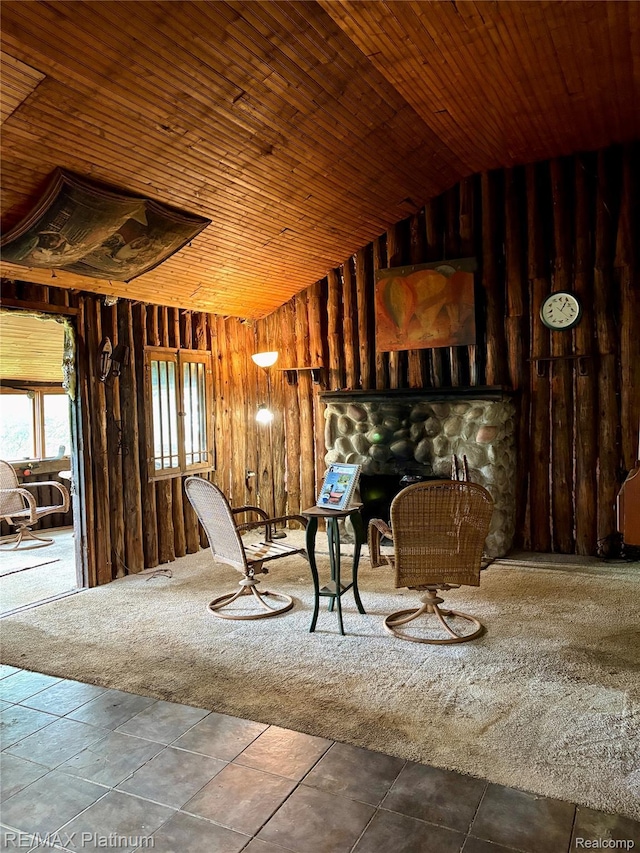 3788 Cedar Point Rd, Howell, MI 48843 - living area featuring vaulted ceiling, wood walls, and wood ceiling