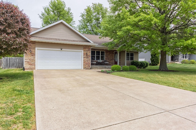 1373 Kristen Path, Saint Joseph, MI 49085 - ranch-style house with a garage, driveway, a shingled roof, a porch, and stone siding