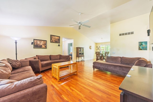 1373 Kristen Path, Saint Joseph, MI 49085 - living room featuring light wood finished floors, ceiling fan, and vaulted ceiling