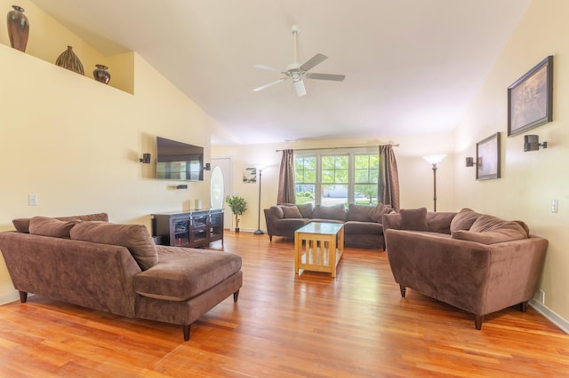 1373 Kristen Path, Saint Joseph, MI 49085 - living room with light wood finished floors, ceiling fan, and high vaulted ceiling