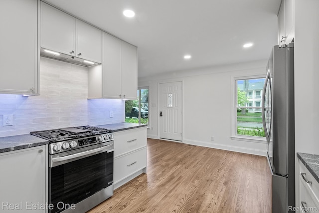 1149 Larkmoor Blvd, Berkley, MI 48072 - kitchen featuring appliances with stainless steel finishes, plenty of natural light, decorative backsplash, light wood-style floors, and recessed lighting