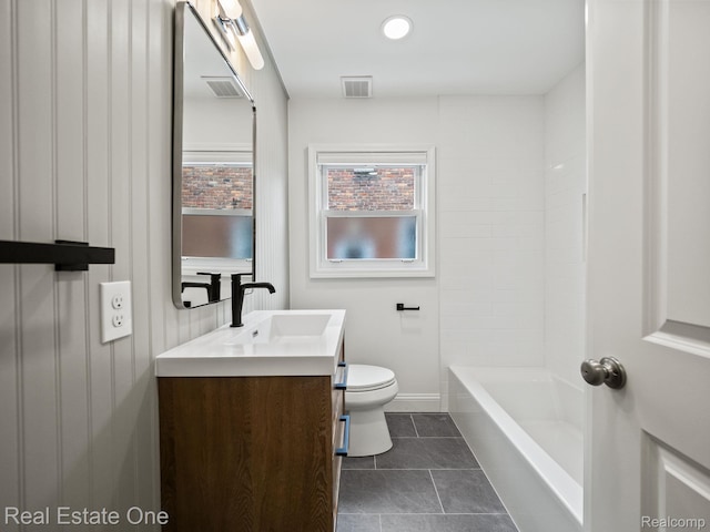 1149 Larkmoor Blvd, Berkley, MI 48072 - bathroom with toilet, vanity, a tub, tile patterned flooring, and baseboards