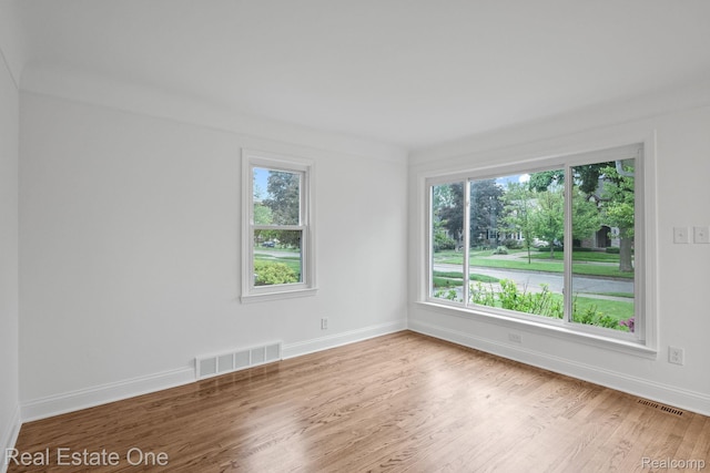 1149 Larkmoor Blvd, Berkley, MI 48072 - unfurnished room with wood finished floors and baseboards