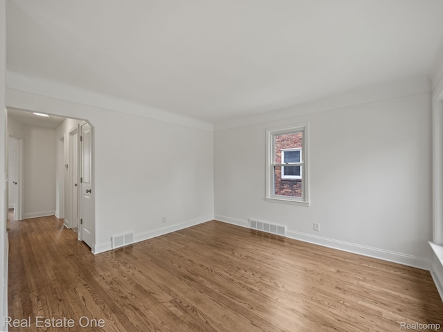 1149 Larkmoor Blvd, Berkley, MI 48072 - unfurnished room with wood finished floors and baseboards