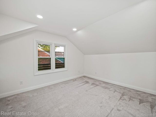 1149 Larkmoor Blvd, Berkley, MI 48072 - additional living space with vaulted ceiling, carpet flooring, recessed lighting, and baseboards