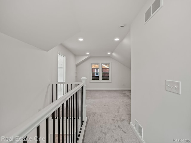 1149 Larkmoor Blvd, Berkley, MI 48072 - corridor featuring light colored carpet, vaulted ceiling, recessed lighting, an upstairs landing, and baseboards