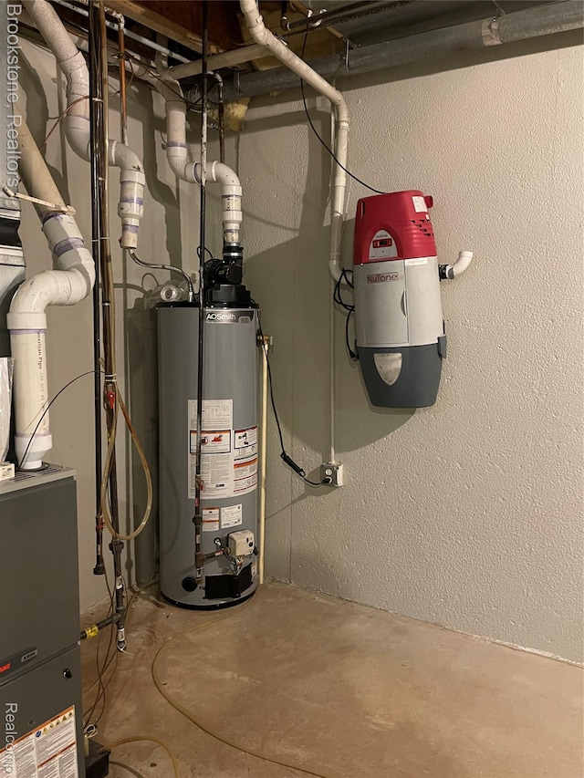 2115 Aldwin Dr, West Bloomfield, MI 48324 - utilities with gas water heater and a central vacuum unit
