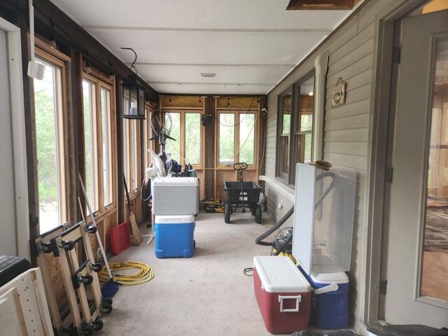 9332 W 10 Mile Rd, Irons, MI 49644 - view of sunroom / solarium