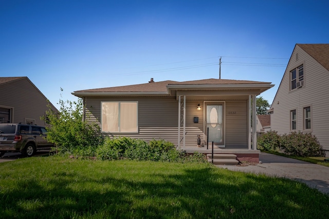 13722 Birrell St, Southgate, MI 48195 - view of front of home featuring a front lawn and covered porch