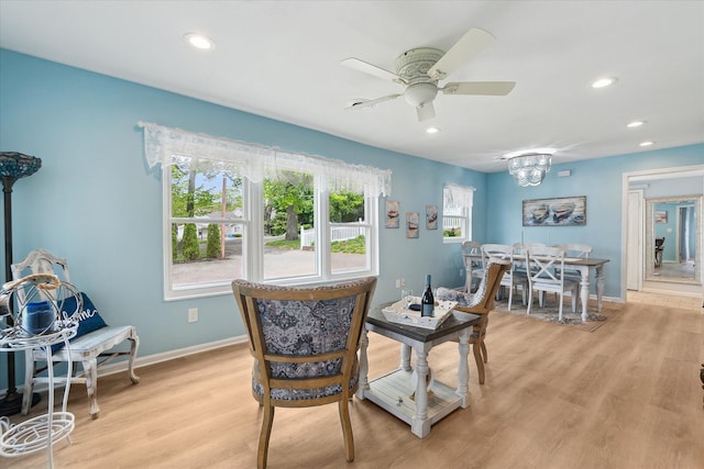 3761 Hunt Rd, Lapeer, MI 48446 - dining room featuring baseboards, a ceiling fan, light wood-style floors, recessed lighting, and a chandelier