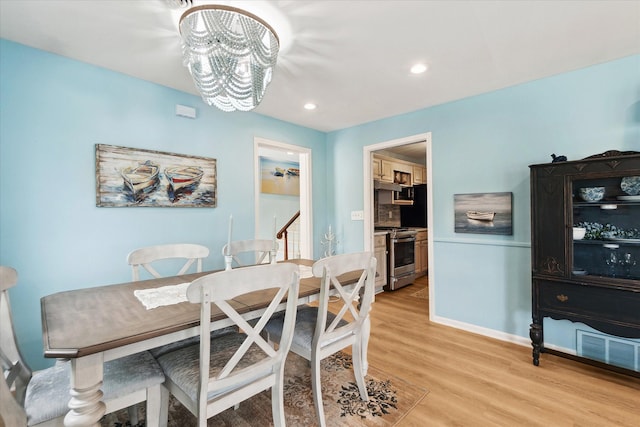 3761 Hunt Rd, Lapeer, MI 48446 - dining area featuring a chandelier, light wood-style floors, baseboards, and recessed lighting