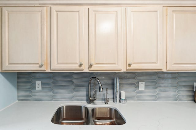 3761 Hunt Rd, Lapeer, MI 48446 - kitchen view of a sink, light countertops, decorative backsplash, and light brown cabinetry